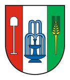 Coat of arms of Deutsch Goritz in the Thermen- & Vulkanland with a tripartite shield. On the left a red background with a white tool, in the middle a white background with a blue, two-tiered fountain, on the right a green background with a yellow ear of corn. The style is clear and graphic, ideal for displaying community properties.